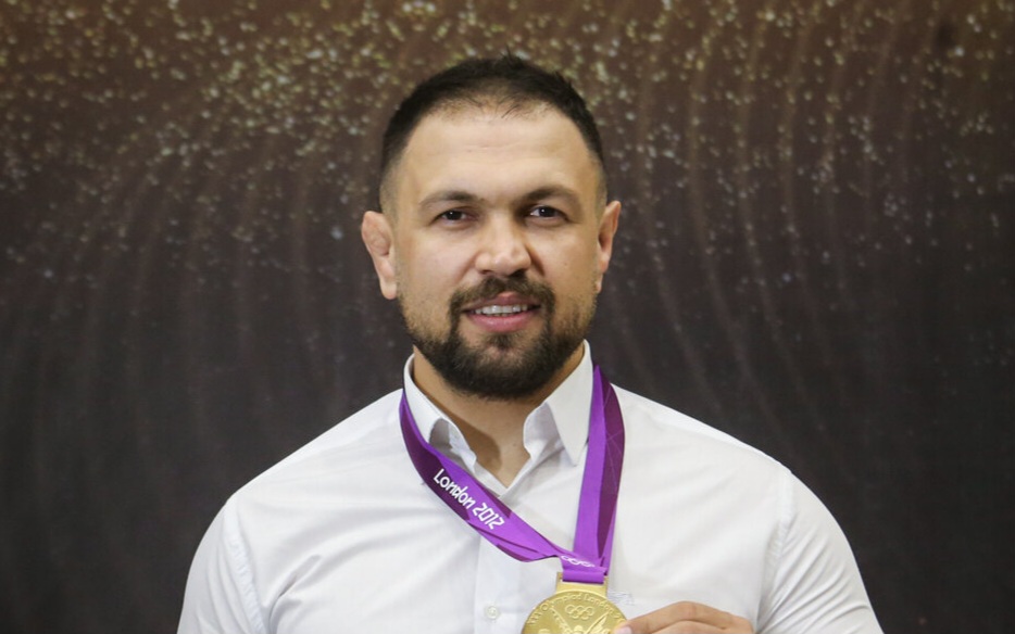 عکس از کمیل قاسمی قهرمان کشتی آزاد ایران