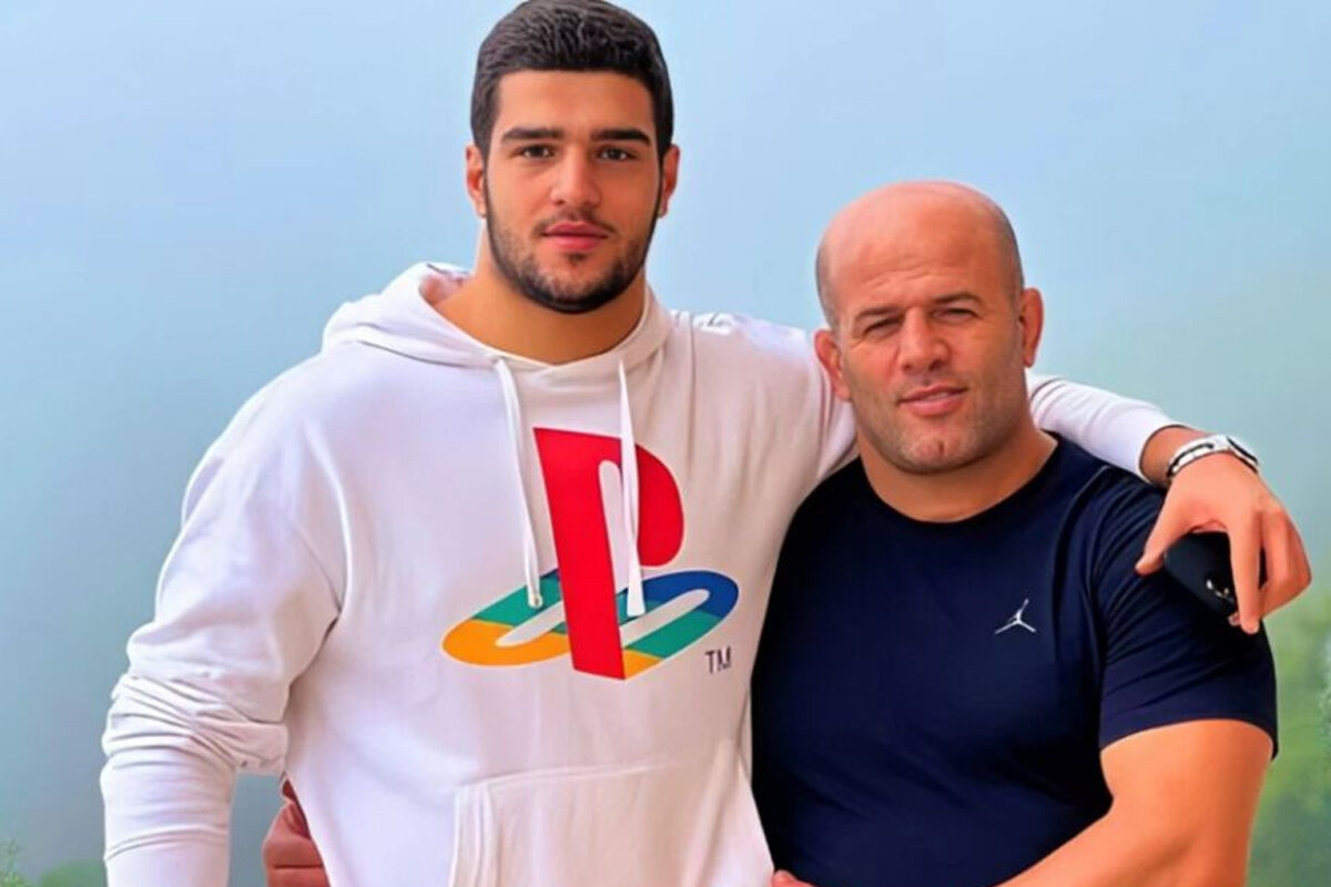 عکس از فردین معصومی کشتی‌گیر سابق ایران و پسرش امیررضا