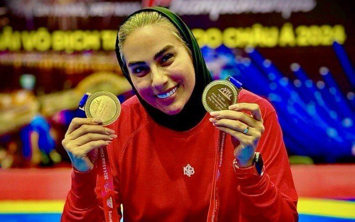 عکس از مهروز ساعی سرمربی تیم تکواندوی زنان ایران